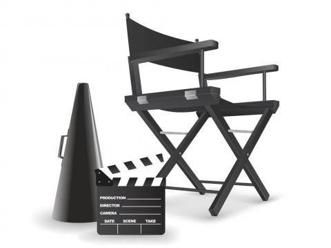 Black and white image of a directors chair