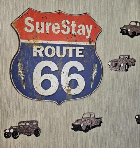 Route 66 Highway Sign highlighting SureStay Hotel