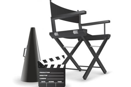 Black and white image of a directors chair