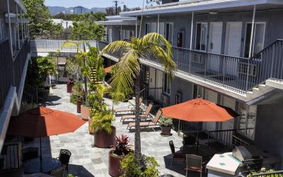 Patio Courtyard with BBQ, Lounges, Tables, and Chairs